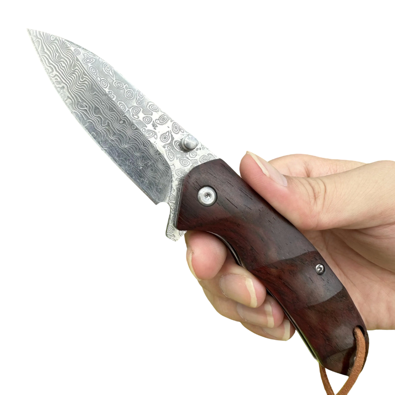 Couteau de Chasse en Acier Damas en Main