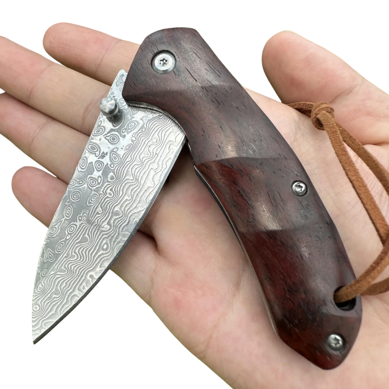 Couteau de Chasse en Acier Damas semi-ouvert