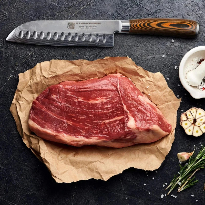 Couteau Japonais Lame Damas présentation  côté de viande