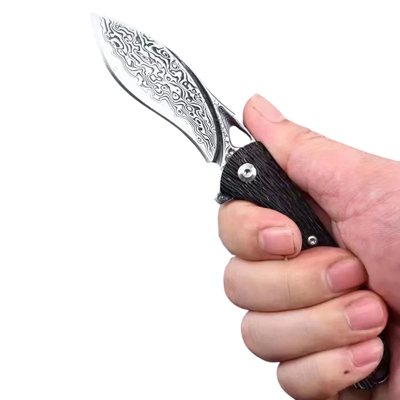 Couteau Kukri Damas Prise en Main