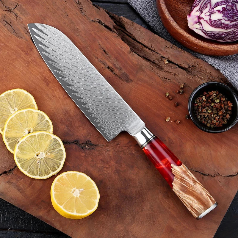 Couteau Santoku en Acier Damas présentation avec des citrons